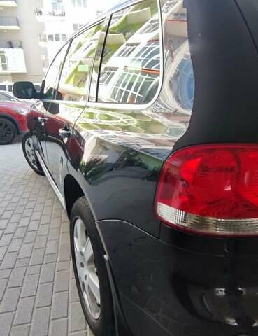 Чорний Фольксваген Туарег, об'ємом двигуна 3 л та пробігом 365 тис. км за 10700 $, фото 10 на Automoto.ua