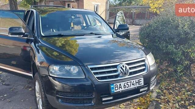 Чорний Фольксваген Туарег, об'ємом двигуна 2.99 л та пробігом 322 тис. км за 10500 $, фото 2 на Automoto.ua