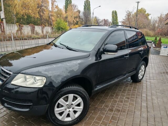 Черный Фольксваген Туарег, объемом двигателя 3 л и пробегом 400 тыс. км за 7200 $, фото 1 на Automoto.ua