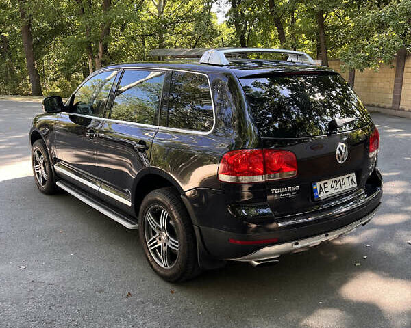 Чорний Фольксваген Туарег, об'ємом двигуна 3 л та пробігом 280 тис. км за 11000 $, фото 5 на Automoto.ua
