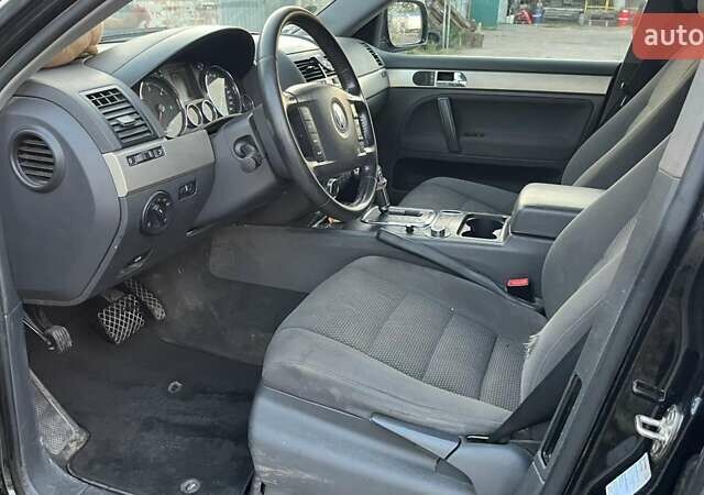 Черный Фольксваген Туарег, объемом двигателя 3 л и пробегом 260 тыс. км за 6000 $, фото 4 на Automoto.ua