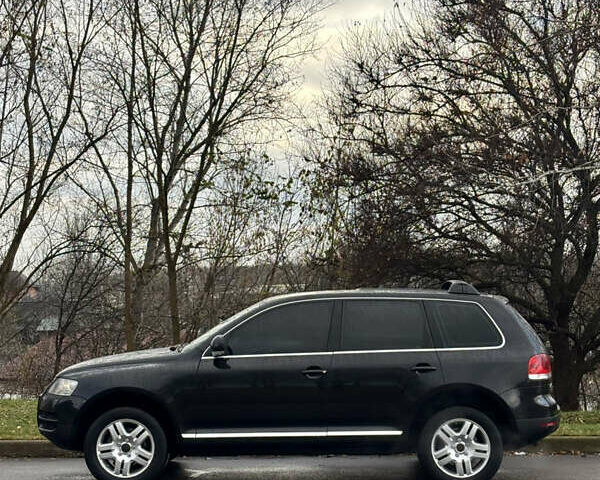 Чорний Фольксваген Туарег, об'ємом двигуна 3.2 л та пробігом 250 тис. км за 7500 $, фото 5 на Automoto.ua