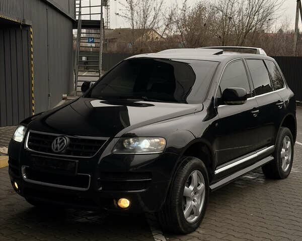 Черный Фольксваген Туарег, объемом двигателя 4.9 л и пробегом 340 тыс. км за 6900 $, фото 75 на Automoto.ua
