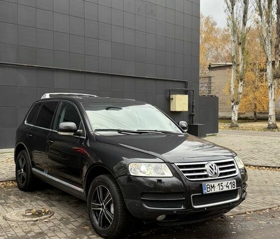 Чорний Фольксваген Туарег, об'ємом двигуна 5 л та пробігом 300 тис. км за 4700 $, фото 2 на Automoto.ua