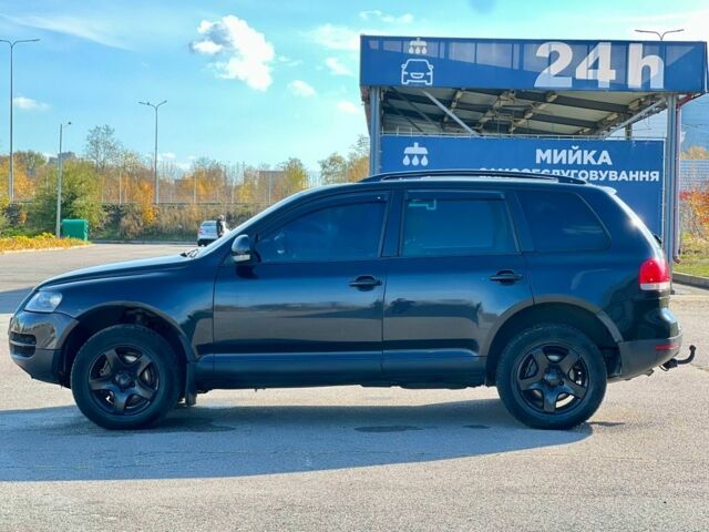 Черный Фольксваген Туарег, объемом двигателя 3 л и пробегом 295 тыс. км за 6900 $, фото 4 на Automoto.ua