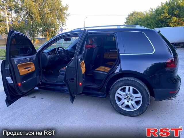 Черный Фольксваген Туарег, объемом двигателя 3 л и пробегом 340 тыс. км за 10800 $, фото 6 на Automoto.ua