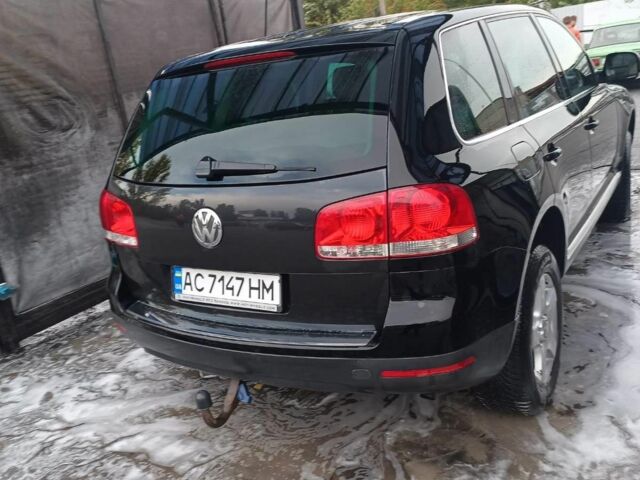 Чорний Фольксваген Туарег, об'ємом двигуна 3 л та пробігом 285 тис. км за 8500 $, фото 2 на Automoto.ua