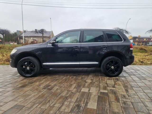 Чорний Фольксваген Туарег, об'ємом двигуна 3 л та пробігом 250 тис. км за 6648 $, фото 1 на Automoto.ua