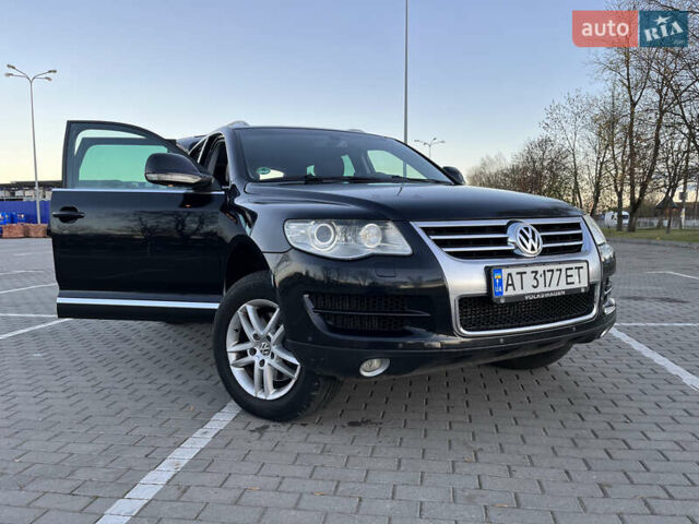 Черный Фольксваген Туарег, объемом двигателя 3 л и пробегом 230 тыс. км за 10200 $, фото 1 на Automoto.ua