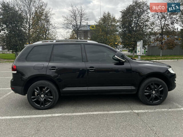 Черный Фольксваген Туарег, объемом двигателя 4.9 л и пробегом 252 тыс. км за 13800 $, фото 11 на Automoto.ua