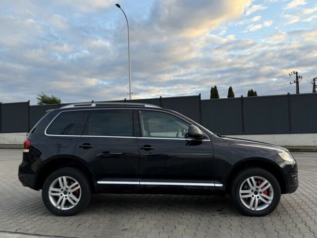 Чорний Фольксваген Туарег, об'ємом двигуна 3 л та пробігом 404 тис. км за 6500 $, фото 1 на Automoto.ua