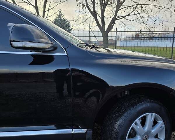 Черный Фольксваген Туарег, объемом двигателя 2.97 л и пробегом 296 тыс. км за 8800 $, фото 14 на Automoto.ua