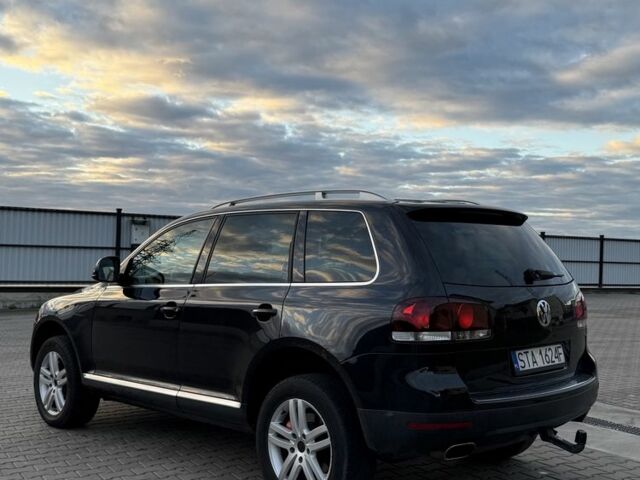 Чорний Фольксваген Туарег, об'ємом двигуна 3 л та пробігом 404 тис. км за 6500 $, фото 2 на Automoto.ua