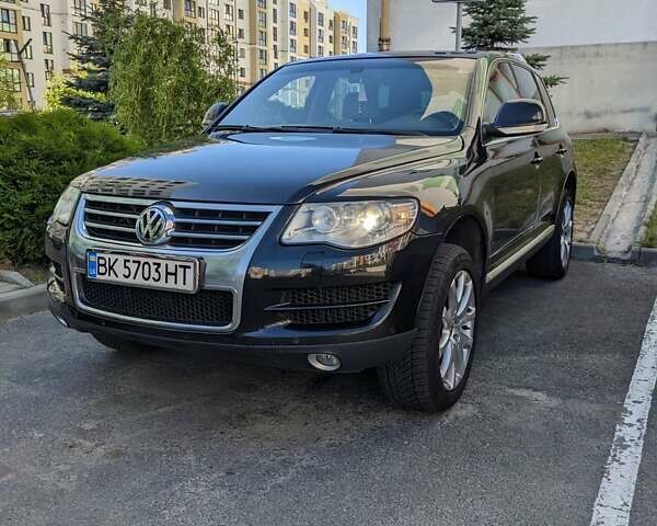 Чорний Фольксваген Туарег, об'ємом двигуна 2.97 л та пробігом 319 тис. км за 10600 $, фото 1 на Automoto.ua