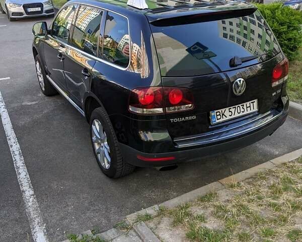 Чорний Фольксваген Туарег, об'ємом двигуна 2.97 л та пробігом 319 тис. км за 10600 $, фото 10 на Automoto.ua