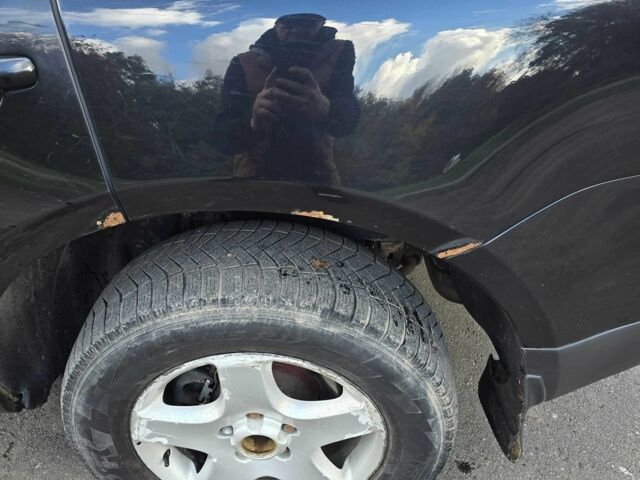 Черный Фольксваген Туарег, объемом двигателя 2.5 л и пробегом 352 тыс. км за 7500 $, фото 7 на Automoto.ua