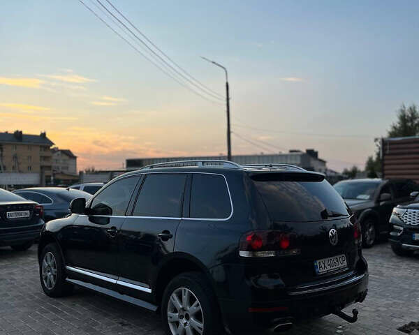 Черный Фольксваген Туарег, объемом двигателя 4.92 л и пробегом 340 тыс. км за 11000 $, фото 4 на Automoto.ua