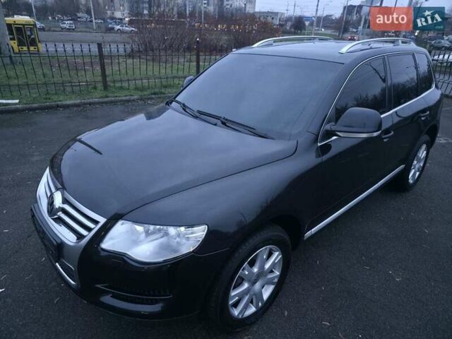 Черный Фольксваген Туарег, объемом двигателя 2.97 л и пробегом 238 тыс. км за 12600 $, фото 2 на Automoto.ua