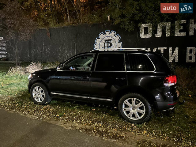 Черный Фольксваген Туарег, объемом двигателя 3 л и пробегом 351 тыс. км за 13500 $, фото 1 на Automoto.ua