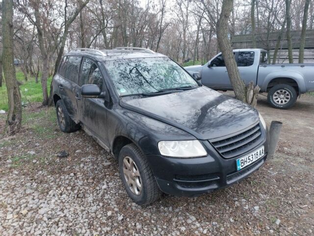 Черный Фольксваген Туарег, объемом двигателя 3 л и пробегом 680 тыс. км за 3000 $, фото 1 на Automoto.ua