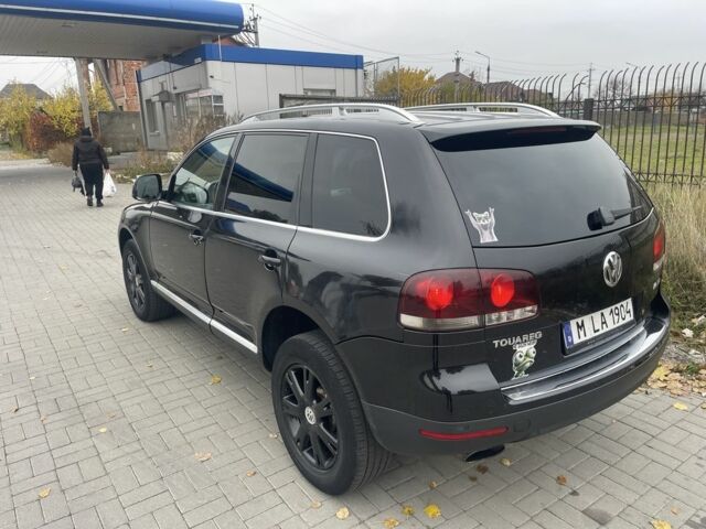 Черный Фольксваген Туарег, объемом двигателя 3 л и пробегом 373 тыс. км за 5400 $, фото 4 на Automoto.ua
