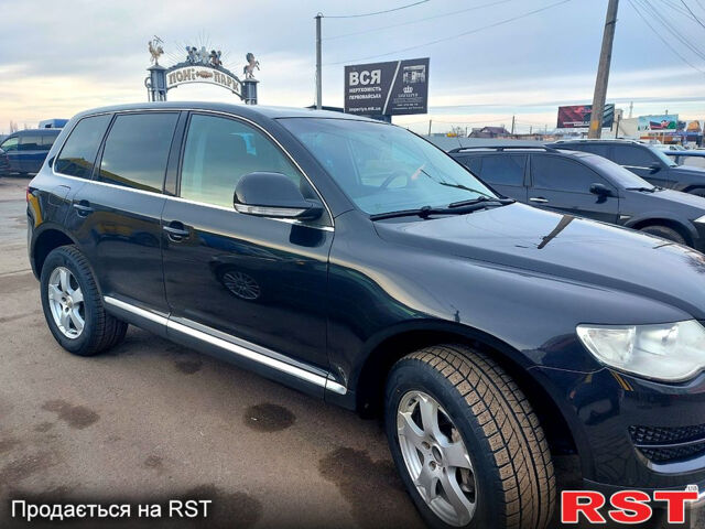 Чорний Фольксваген Туарег, об'ємом двигуна 3 л та пробігом 404 тис. км за 9500 $, фото 1 на Automoto.ua