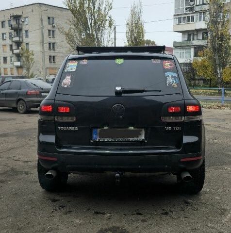 Чорний Фольксваген Туарег, об'ємом двигуна 3 л та пробігом 347 тис. км за 6200 $, фото 3 на Automoto.ua