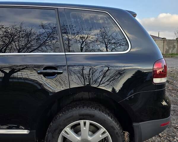 Черный Фольксваген Туарег, объемом двигателя 2.97 л и пробегом 296 тыс. км за 8800 $, фото 13 на Automoto.ua