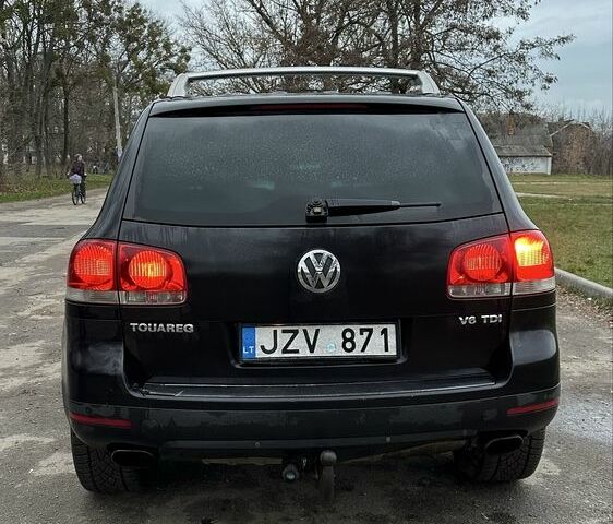 Чорний Фольксваген Туарег, об'ємом двигуна 3 л та пробігом 250 тис. км за 3350 $, фото 5 на Automoto.ua