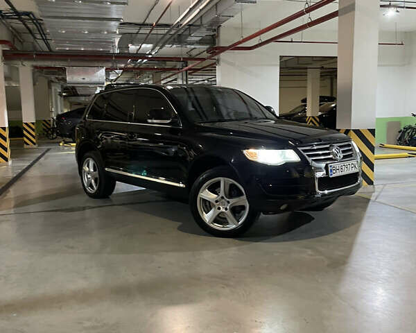 Чорний Фольксваген Туарег, об'ємом двигуна 3 л та пробігом 185 тис. км за 14500 $, фото 2 на Automoto.ua