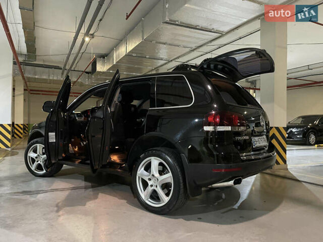 Чорний Фольксваген Туарег, об'ємом двигуна 3 л та пробігом 185 тис. км за 14500 $, фото 6 на Automoto.ua