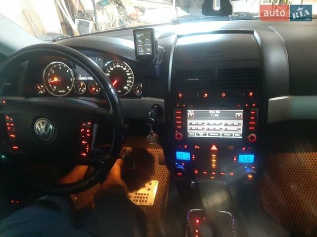 Черный Фольксваген Туарег, объемом двигателя 3 л и пробегом 445 тыс. км за 11500 $, фото 6 на Automoto.ua