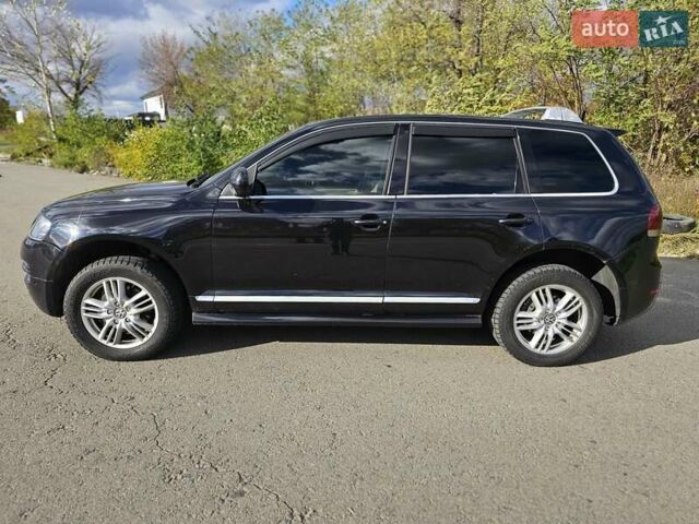 Черный Фольксваген Туарег, объемом двигателя 4.2 л и пробегом 356 тыс. км за 11000 $, фото 6 на Automoto.ua