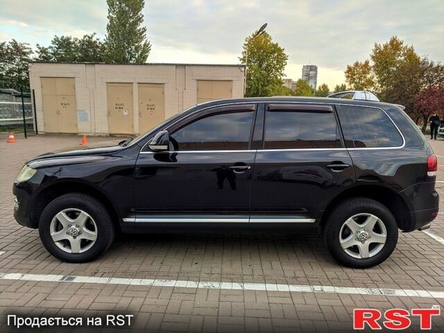 Чорний Фольксваген Туарег, об'ємом двигуна 3 л та пробігом 198 тис. км за 11300 $, фото 2 на Automoto.ua