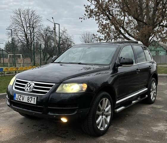 Чорний Фольксваген Туарег, об'ємом двигуна 3 л та пробігом 250 тис. км за 3350 $, фото 3 на Automoto.ua