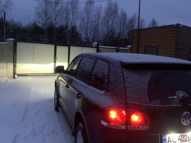 Черный Фольксваген Туарег, объемом двигателя 3 л и пробегом 236 тыс. км за 13000 $, фото 1 на Automoto.ua