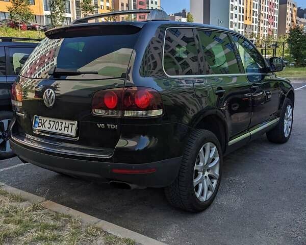 Чорний Фольксваген Туарег, об'ємом двигуна 2.97 л та пробігом 319 тис. км за 10600 $, фото 7 на Automoto.ua