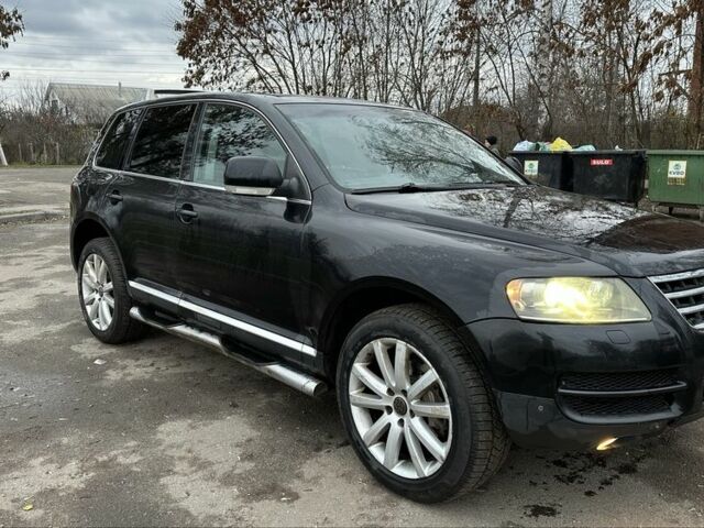 Чорний Фольксваген Туарег, об'ємом двигуна 3 л та пробігом 250 тис. км за 3350 $, фото 2 на Automoto.ua