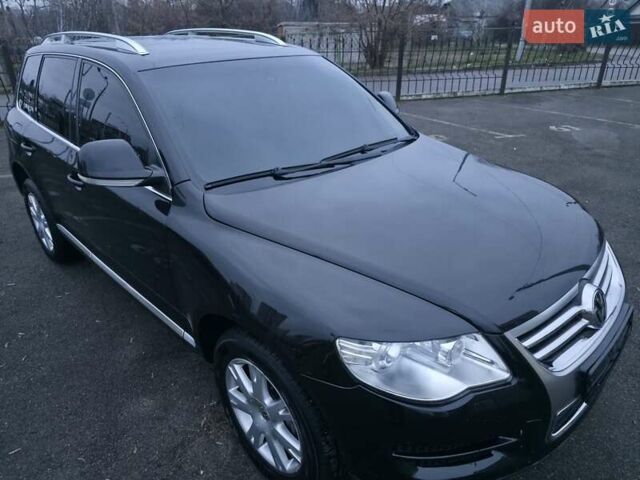 Черный Фольксваген Туарег, объемом двигателя 2.97 л и пробегом 238 тыс. км за 12600 $, фото 1 на Automoto.ua