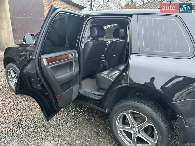 Чорний Фольксваген Туарег, об'ємом двигуна 2.46 л та пробігом 174 тис. км за 11000 $, фото 11 на Automoto.ua