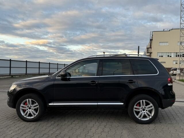 Чорний Фольксваген Туарег, об'ємом двигуна 3 л та пробігом 404 тис. км за 6500 $, фото 4 на Automoto.ua