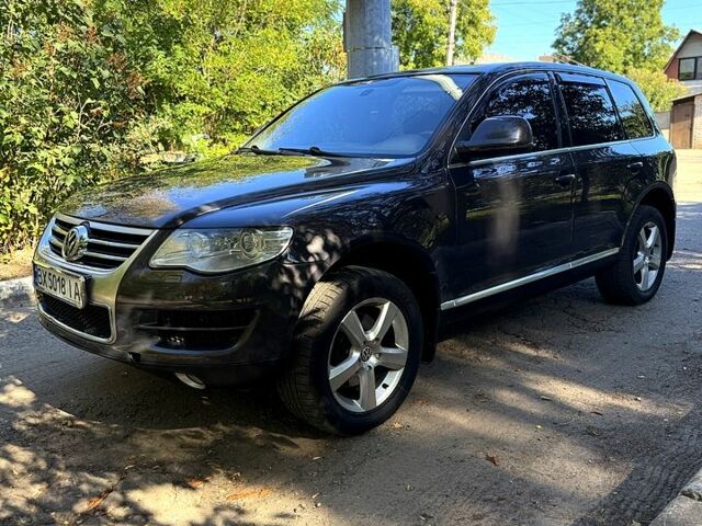 Фольксваген Туарег 2007 у Харкові на Automoto.ua Чорний Фольксваген Туарег, об'ємом двигуна 3.6 л та пробігом 240 тис. км за 8350 $, фото 1 на Automoto.ua