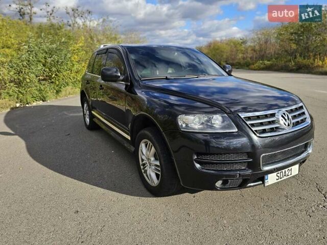 Черный Фольксваген Туарег, объемом двигателя 4.2 л и пробегом 356 тыс. км за 11000 $, фото 8 на Automoto.ua