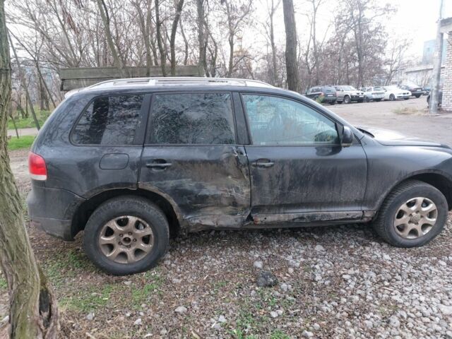 Черный Фольксваген Туарег, объемом двигателя 3 л и пробегом 680 тыс. км за 3000 $, фото 2 на Automoto.ua