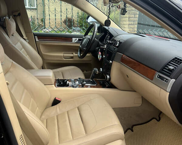 Черный Фольксваген Туарег, объемом двигателя 3 л и пробегом 244 тыс. км за 11700 $, фото 8 на Automoto.ua