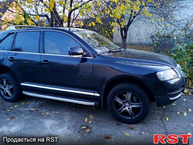 Чорний Фольксваген Туарег, об'ємом двигуна 3.6 л та пробігом 255 тис. км за 8288 $, фото 1 на Automoto.ua