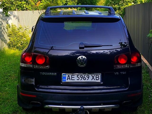 Чорний Фольксваген Туарег, об'ємом двигуна 3 л та пробігом 345 тис. км за 10500 $, фото 1 на Automoto.ua