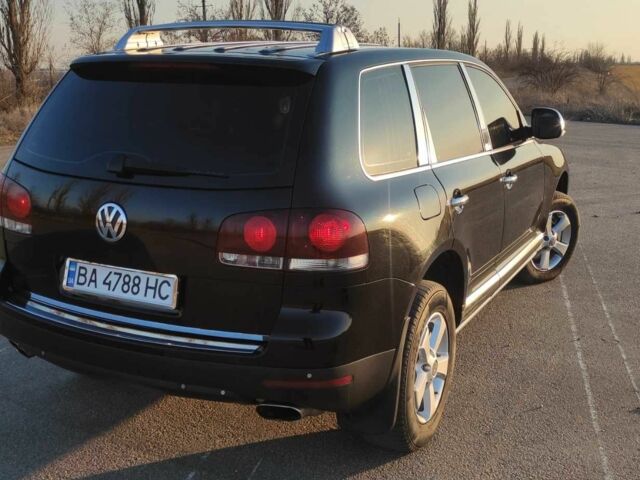 Черный Фольксваген Туарег, объемом двигателя 3 л и пробегом 290 тыс. км за 12300 $, фото 16 на Automoto.ua