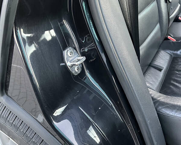 Черный Фольксваген Туарег, объемом двигателя 3 л и пробегом 230 тыс. км за 10200 $, фото 9 на Automoto.ua