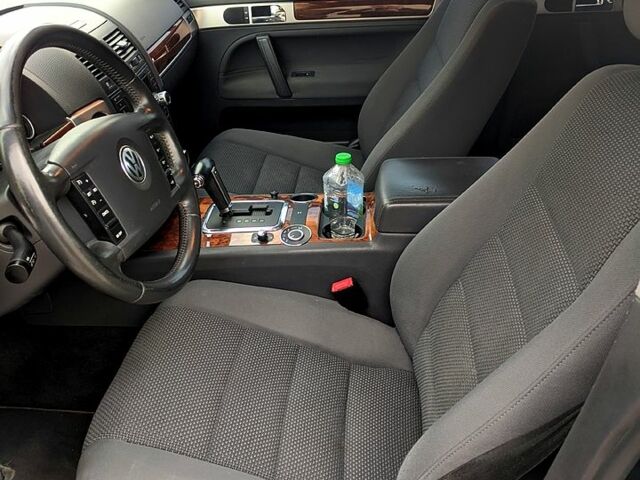 Чорний Фольксваген Туарег, об'ємом двигуна 3 л та пробігом 198 тис. км за 11300 $, фото 6 на Automoto.ua